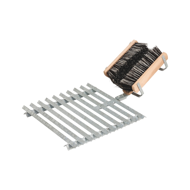 Grattoir avec brosse pour nettoyer les chaussures sur chantier