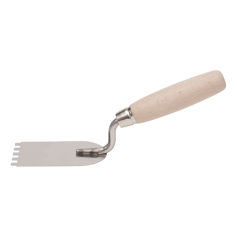Spatule dentée pour carreaux de plinthe et espaces restreints