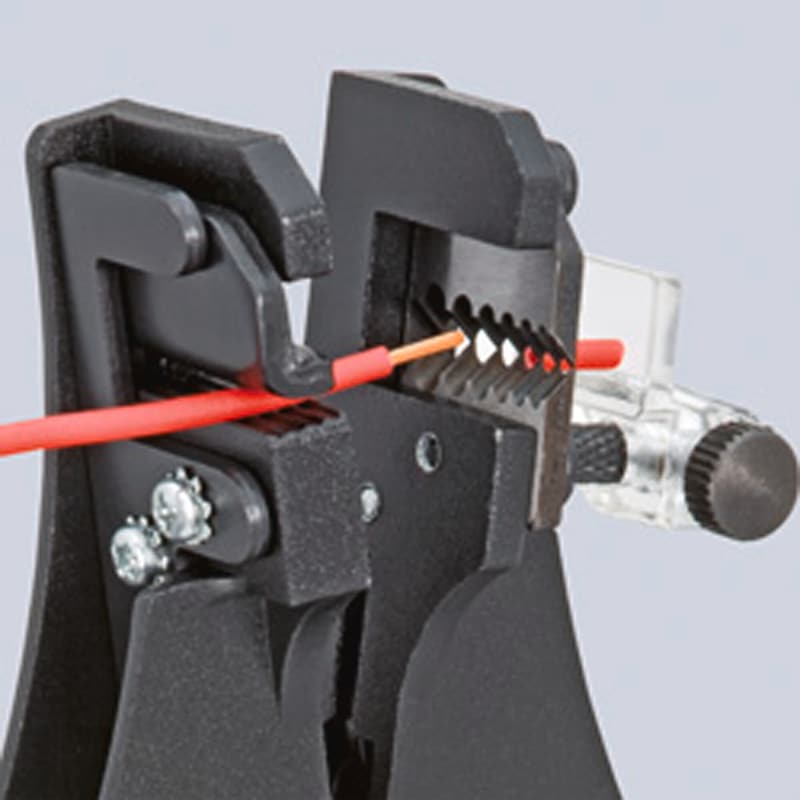 Pince à dénuder KNIPEX avec couteaux de découpe, 180 mm, poignée en plastique - Système de suspension de précision avec poinçons estampeurs